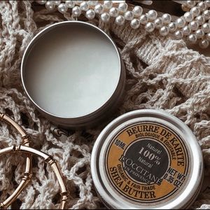 L'Occitane Organic Shea Butter in reusable tin with two soaps